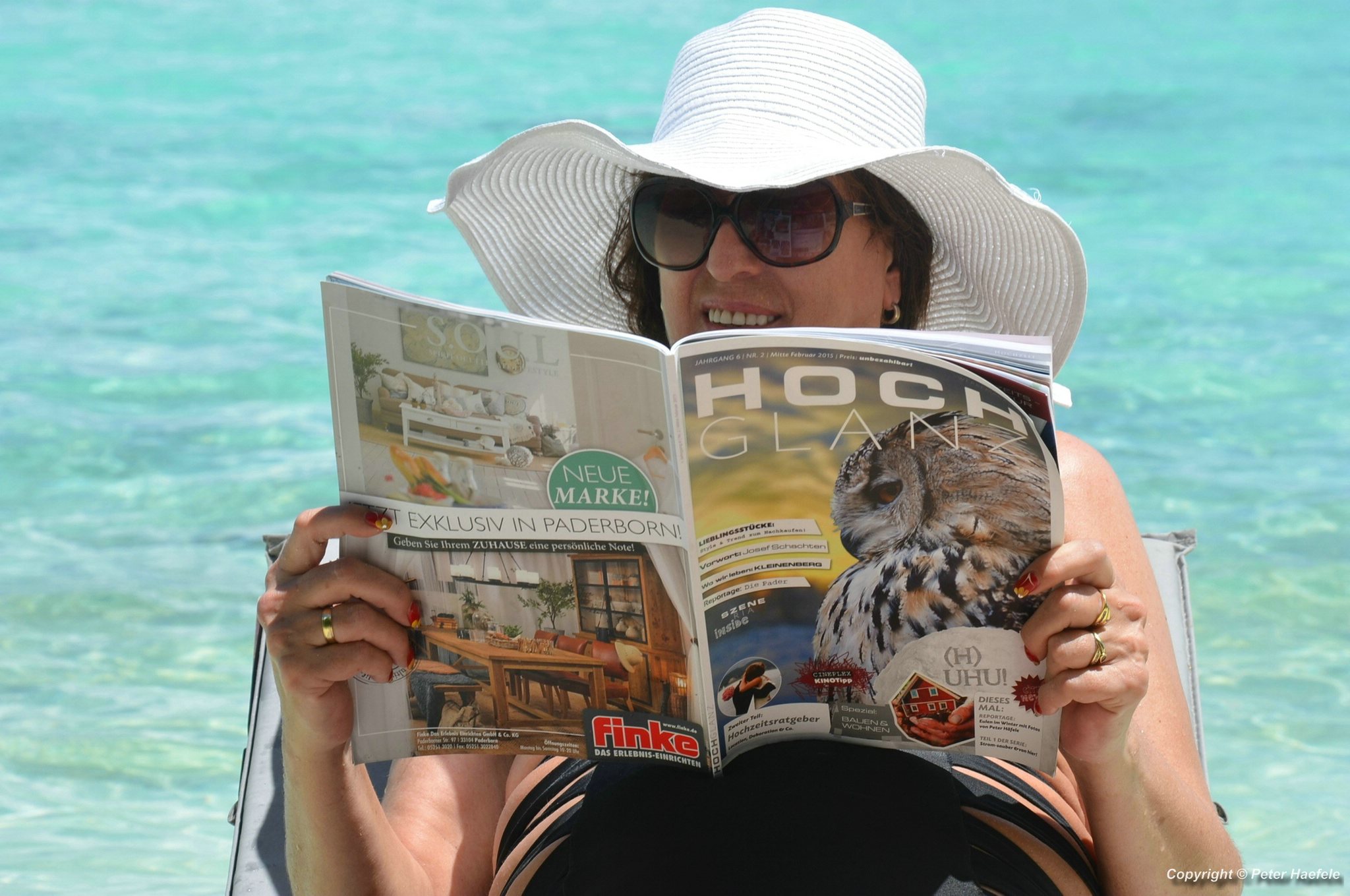 Fotoshooting Frau mit Strohhut Malediven Sun Island Resort und Spa Sued Ari-Atoll